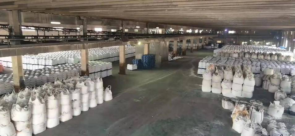 Large quantities of premium chemicals stored in a warehouse.