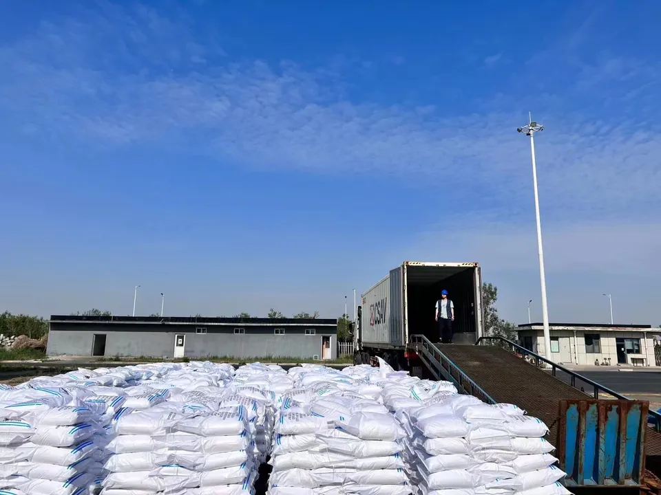 Ammonium Chloride loading into a container at Camachem