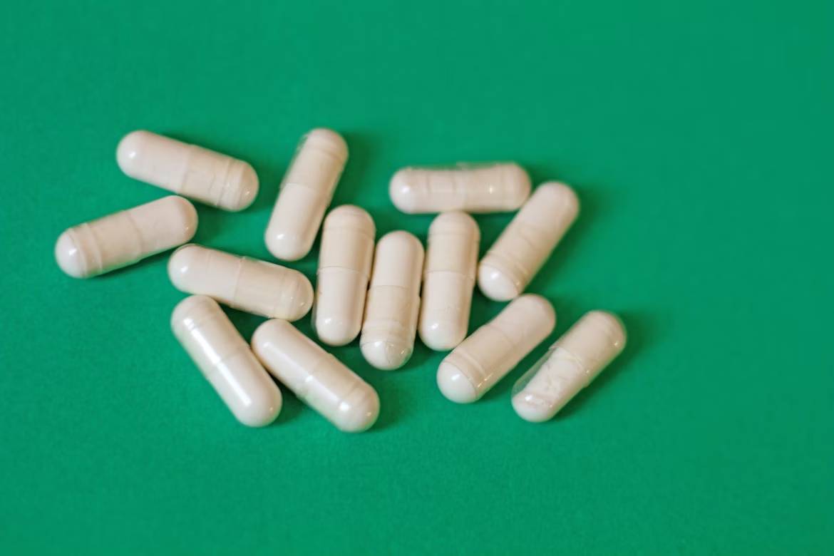 Sodium Selenite used in pharmaceutical tablets and supplements, shown as white pills in blister packaging.