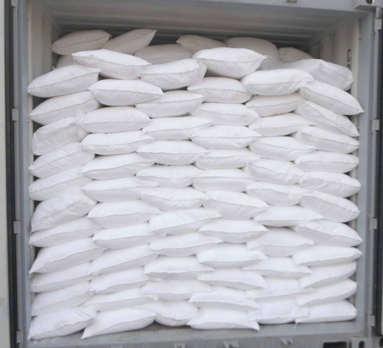 Bulk packaging of sodium metabisulfite in industrial sacks.