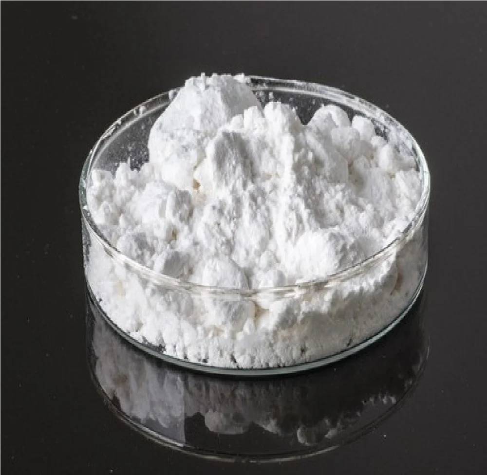 Close up of boron oxide powder in a dish 